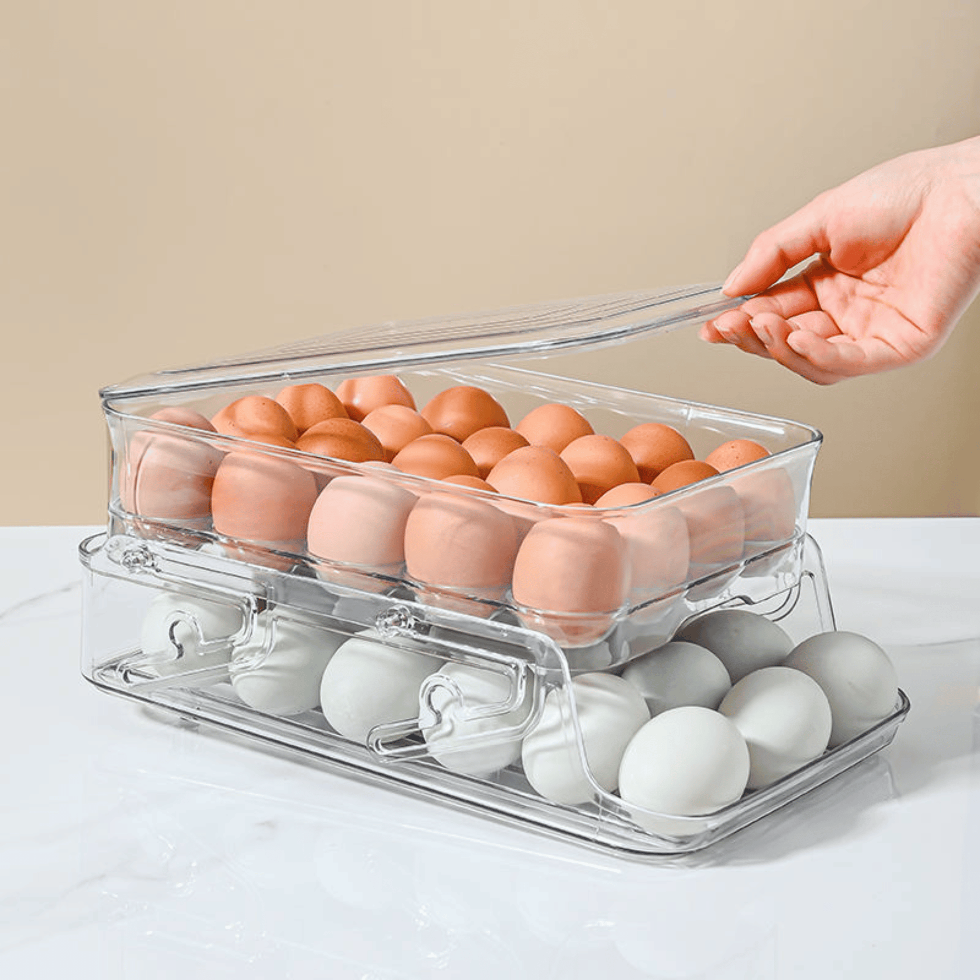 Auto rolling egg tray securely holding medium and large eggs