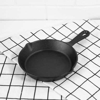 Compact 14cm mini fry pan stored in small kitchen cabinet